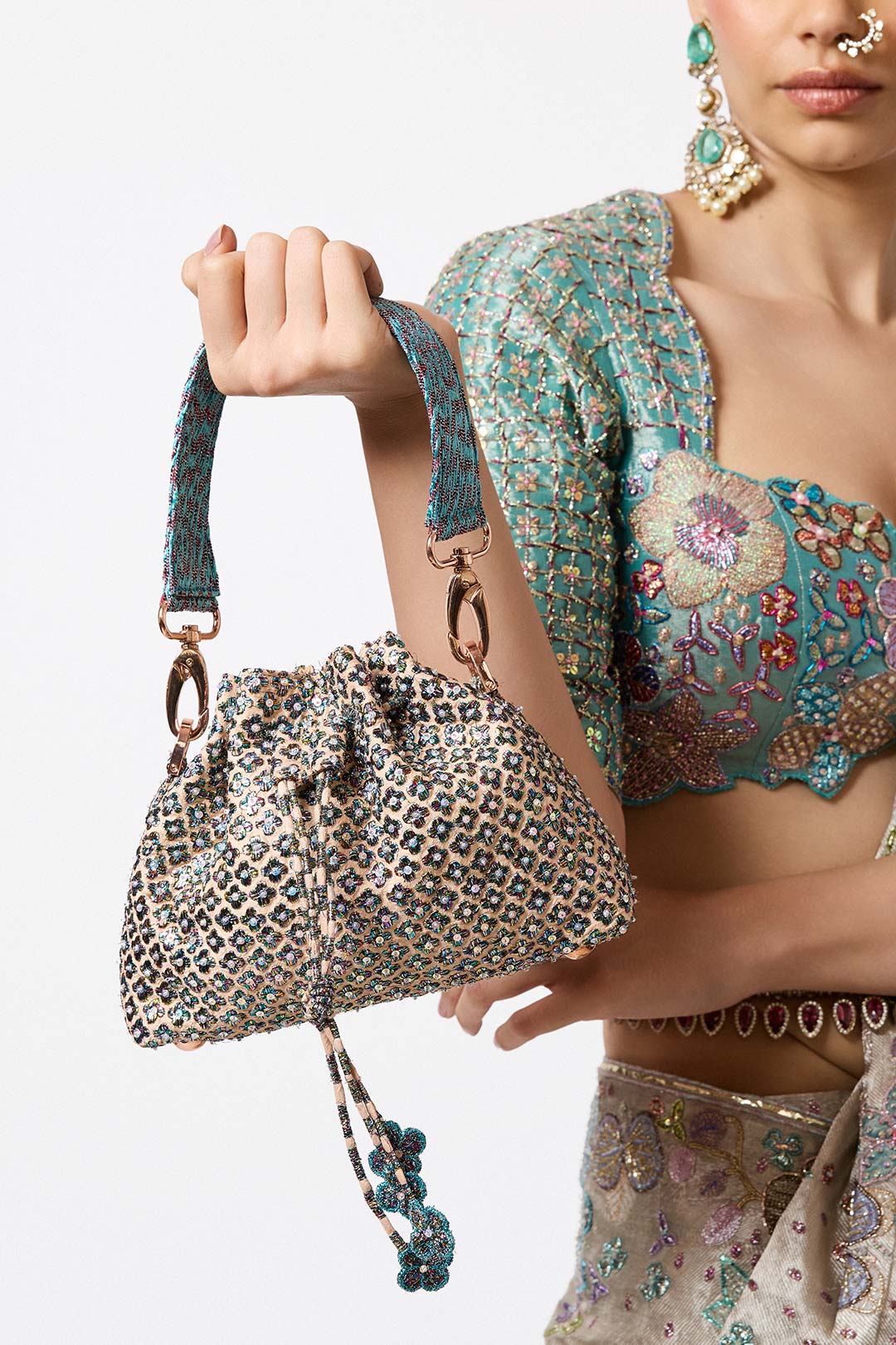 Rear view of silver applique Banarasi tissue by Aisha Rao