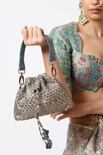 Rear view of silver applique Banarasi tissue by Aisha Rao