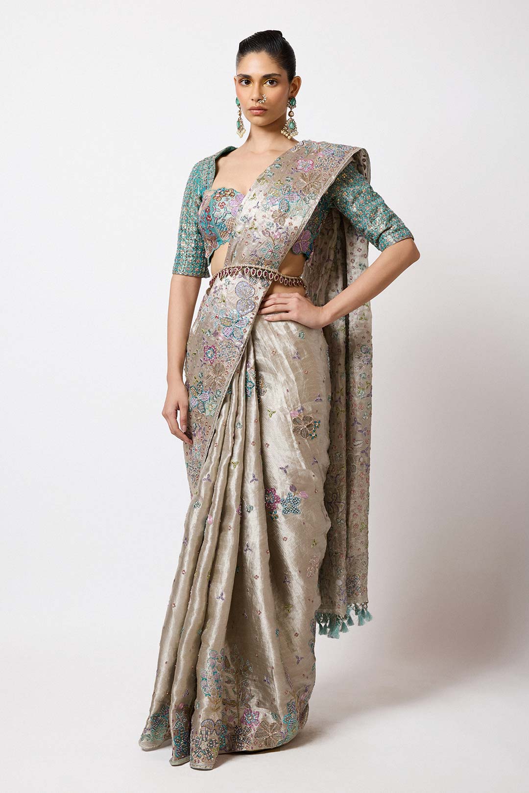 Woman in silver applique Banarasi set right profile view