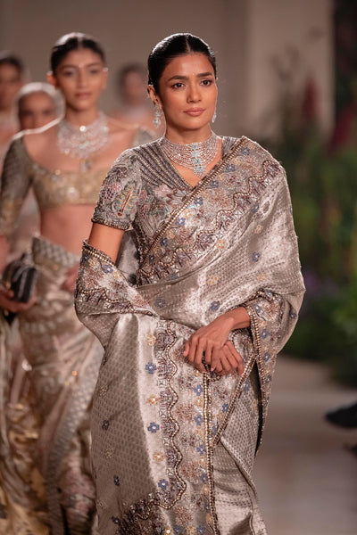 “Styled look of the Wild At Heart silver Banarasi tissue brocade saree with modern draping.”