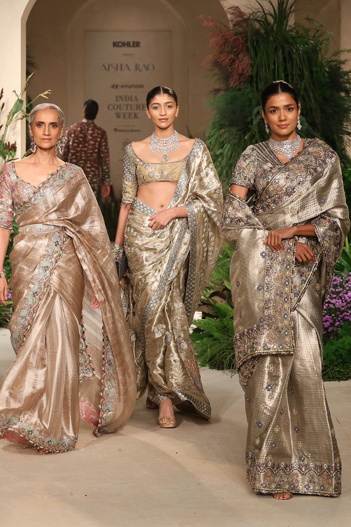 “Closeup of the silver tissue V-neck blouse paired with the Banarasi brocade saree.”