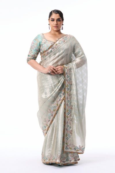 wild at heart silver applique embellished Banarasi Tissue Brocade border saree with blue tissue blouse.