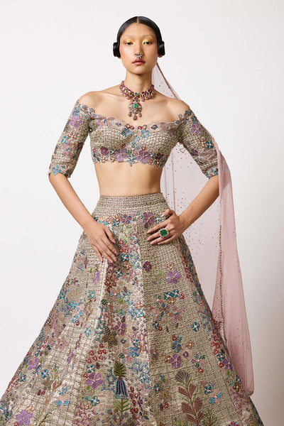Silver Gold Banarasi Tissue Brocade Lehenga styled with a matching blouse and dupatta, highlighting the rich brocade texture.