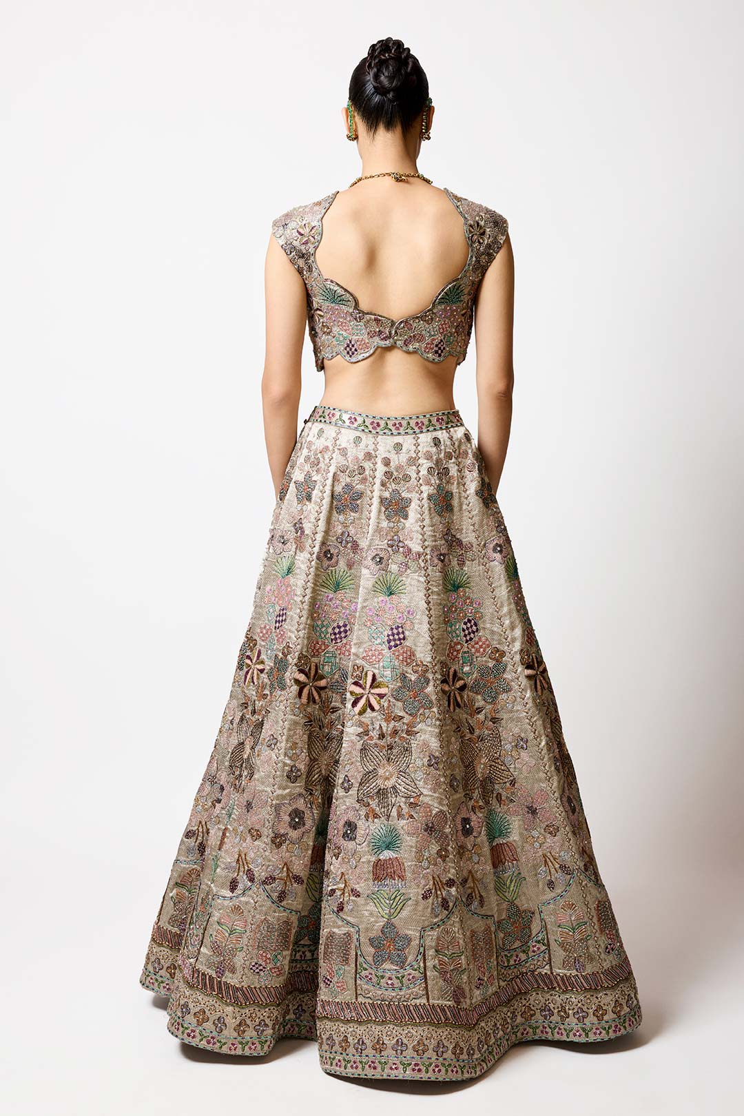 Silver gold embroidery and neckline detail close-up