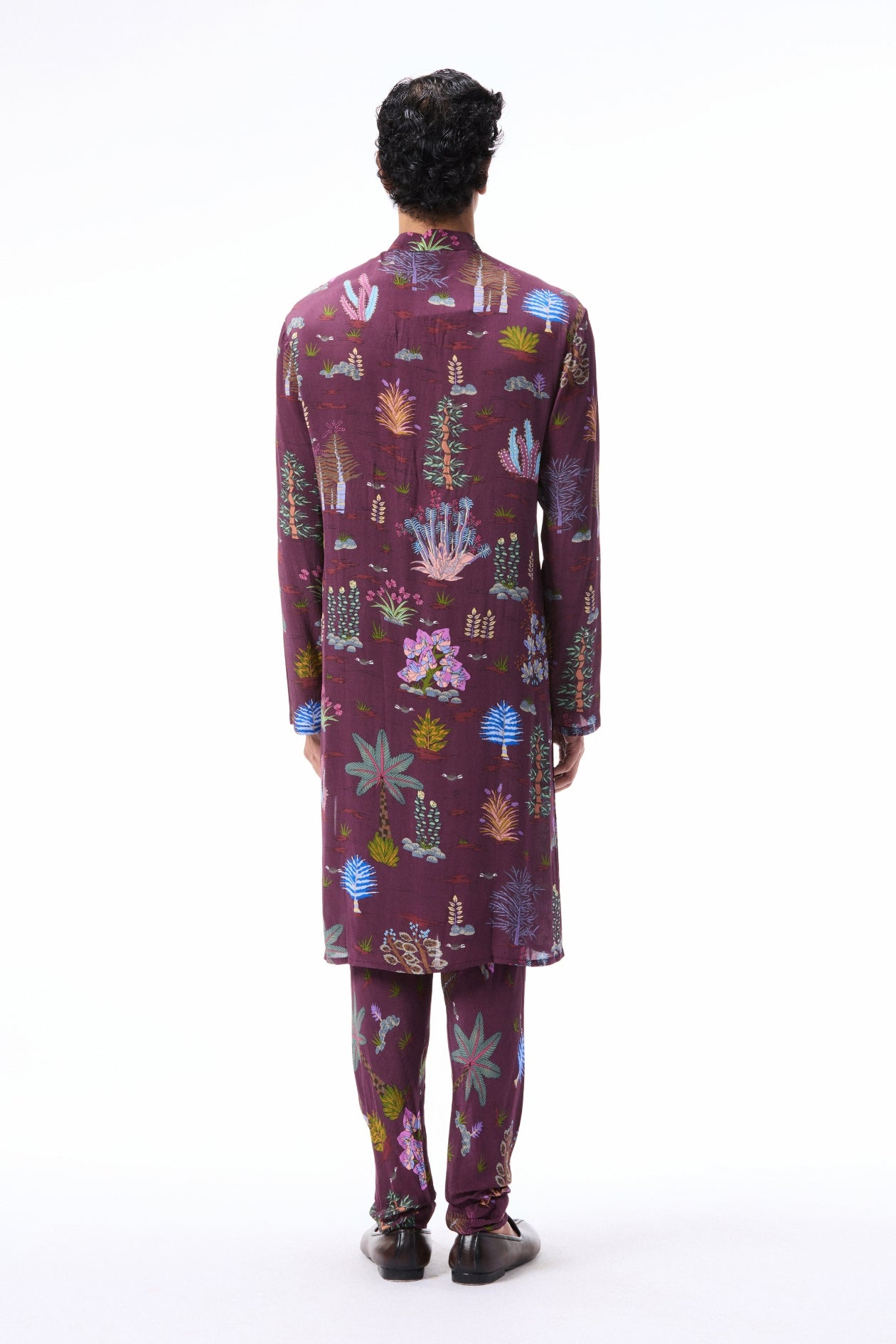 Back profile of the teakberry printed mulberry crepe kurta paired with coordinating pants.