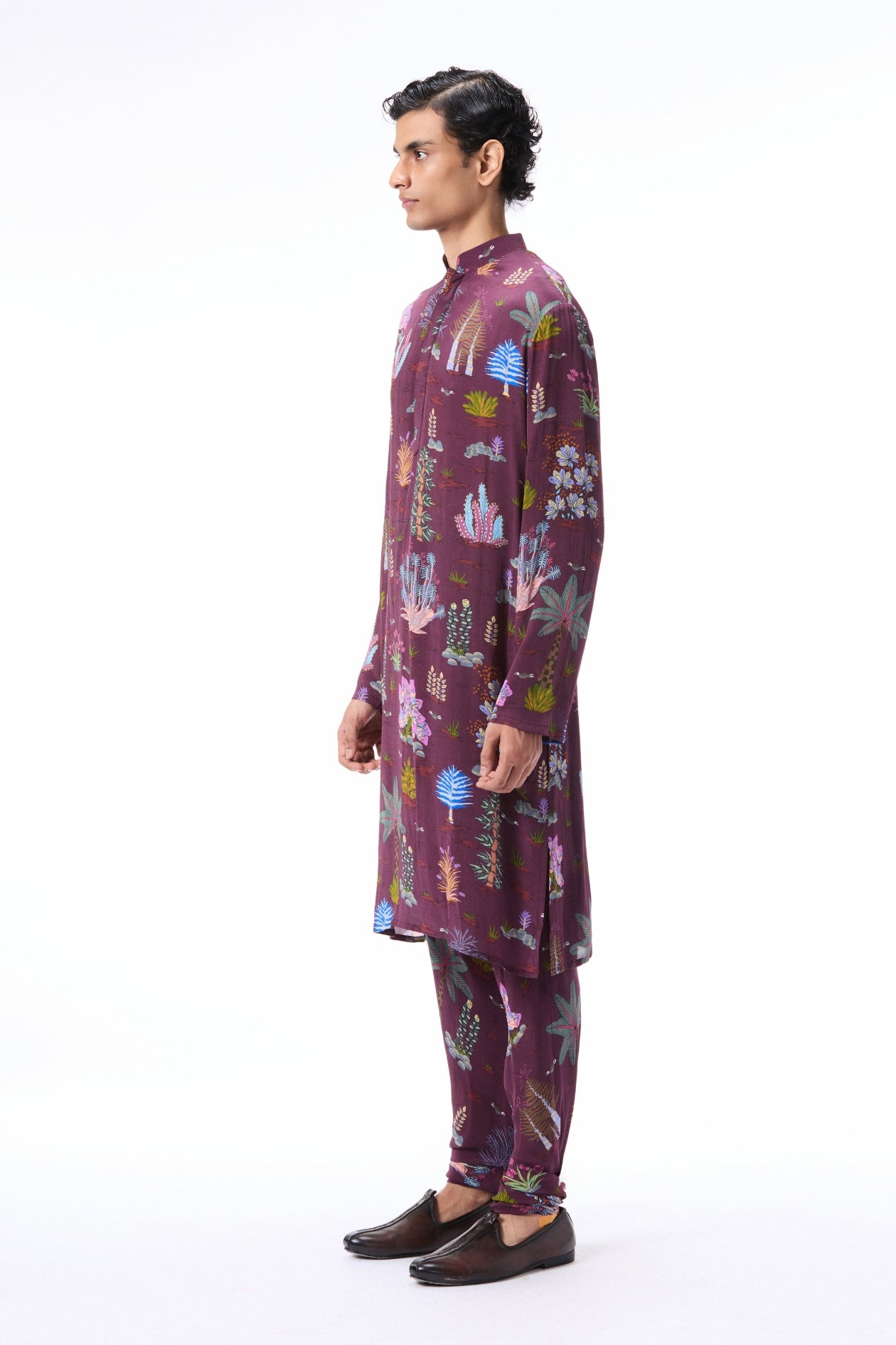 Closeup capturing the teakberry print on the mulberry crepe kurta.