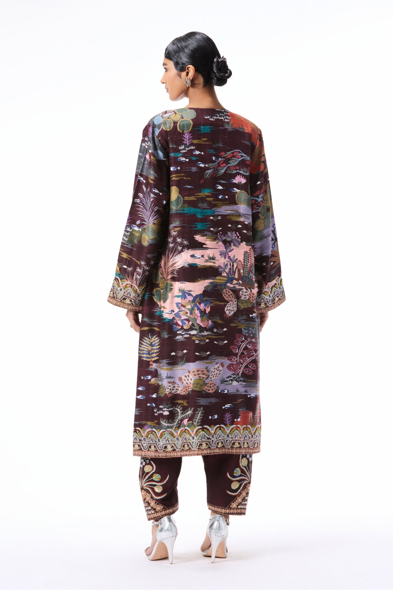 Back profile of the teakberry printed raw silk heavy kurta paired with chanderi silk pants.