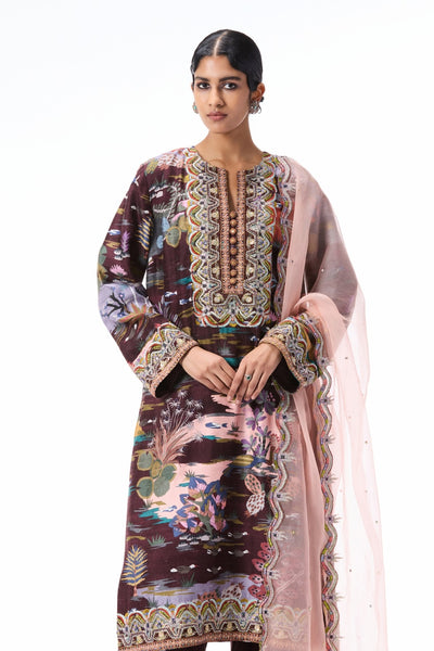 Closeup capturing the teakberry print on the raw silk kurta.