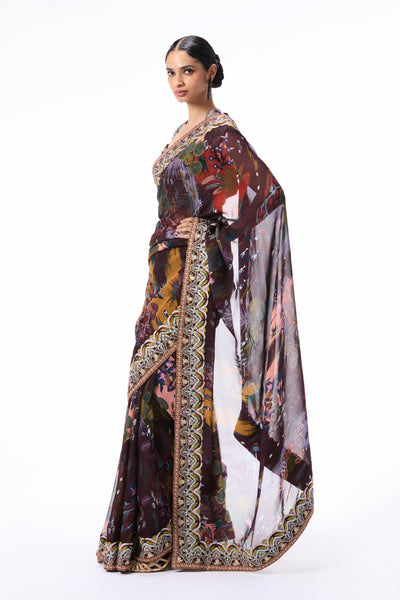 Side angle shot of the raw silk blouse styled with the teakberry printed organza saree.