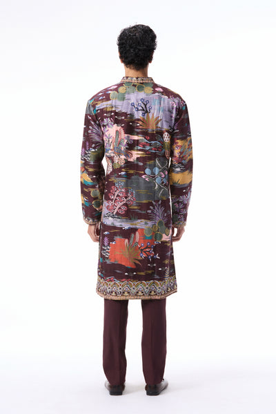 Back profile of the teakberry printed raw silk kurta styled with twill poplin pants.