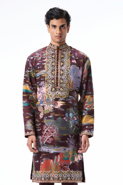 Neckline detail shot showing the applique work on the teakberry printed raw silk kurta.