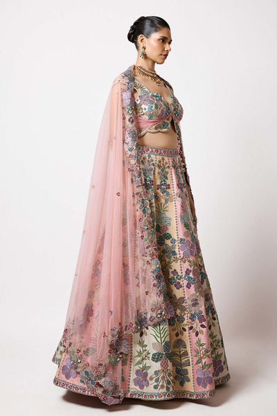 Woman in tricolour HK lehenga with applique right profile