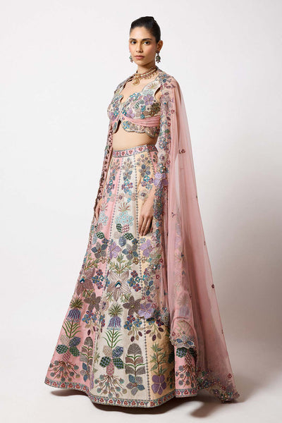 Woman wearing Aisha Rao tricolour raw silk applique lehenga
