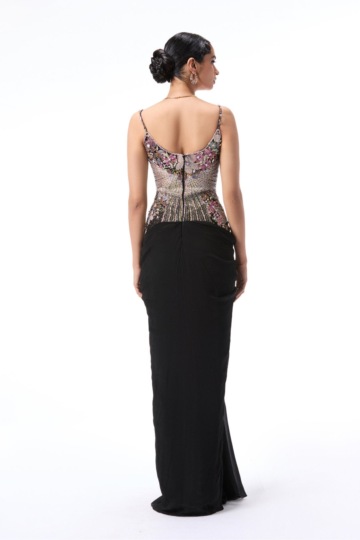 Back view of black applique embellished chiffon and tulle gown from Aisha Rao collection