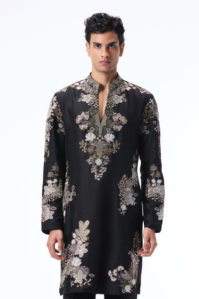 Man wearing a black embroidered kurta 
