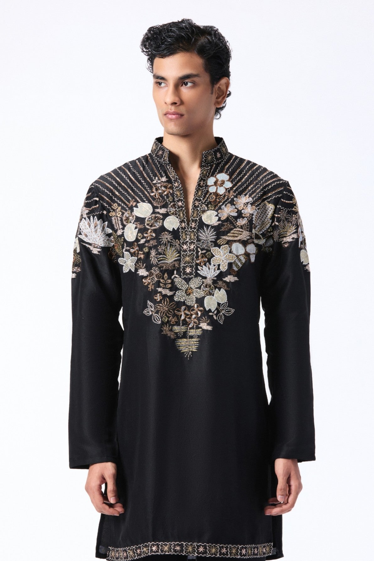 Man wearing a black embroidered kurta 