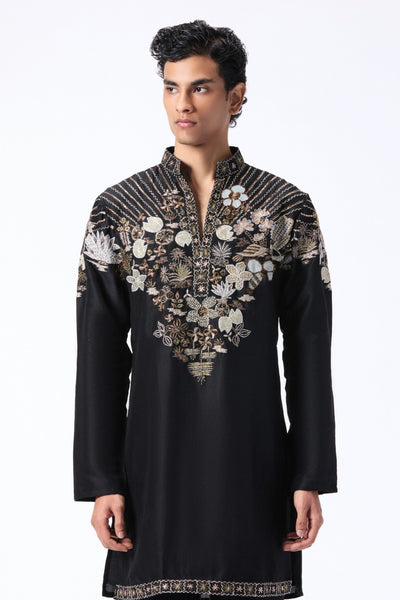 Man wearing a black embroidered kurta 