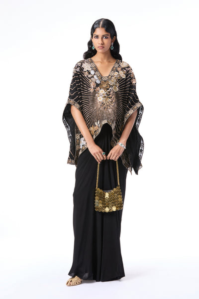 Front view of model wearing black applique embellished mulberry crepe tunic and draped skirt by Aisha Rao