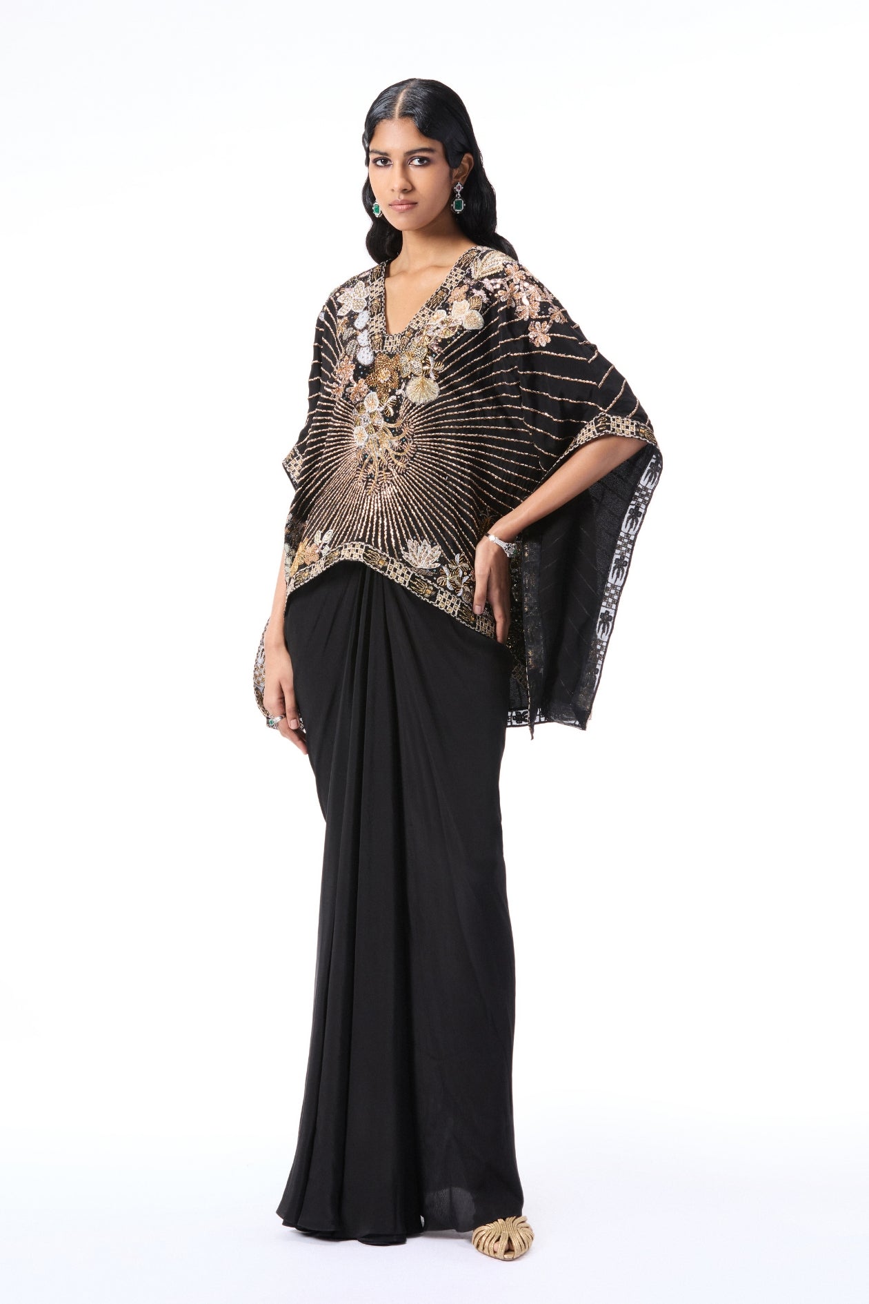 Black applique embellished mulberry crepe tunic with pleated draped skirt shown in front angle