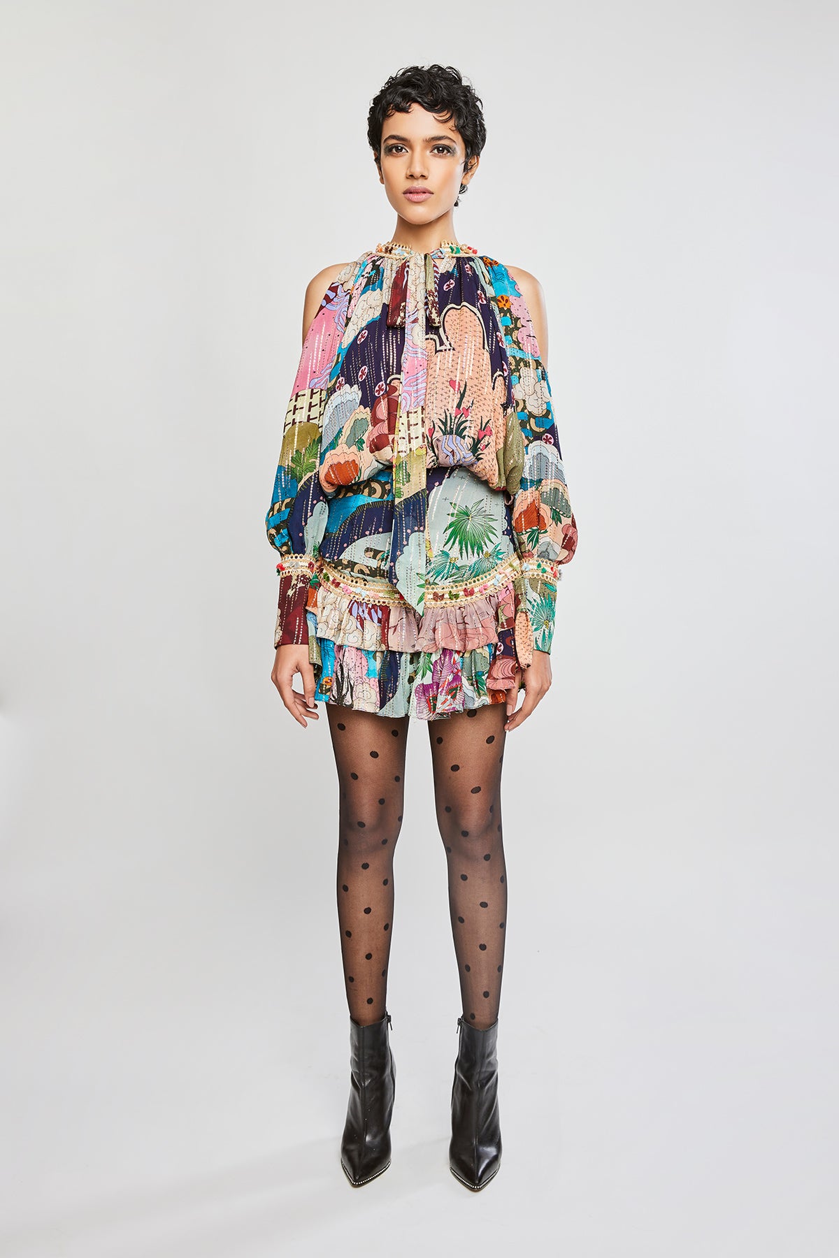 Front view of Trencadís multi-color dobby maze cold shoulder dress