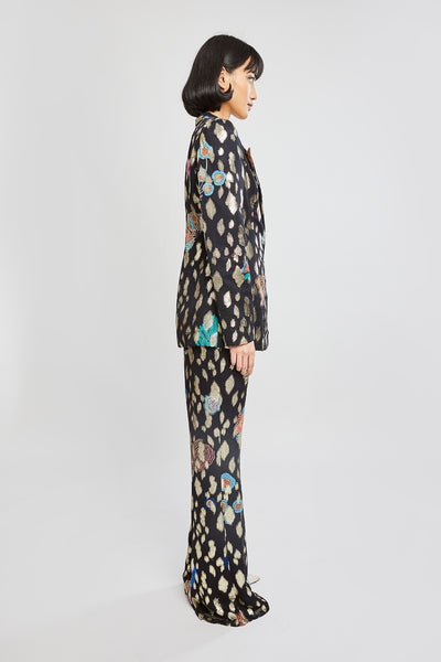 Wide-leg pant drape on right side of blazer set