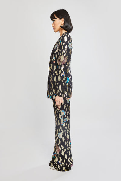 Neha Dhupia in wide-leg pants and black blazer – left view