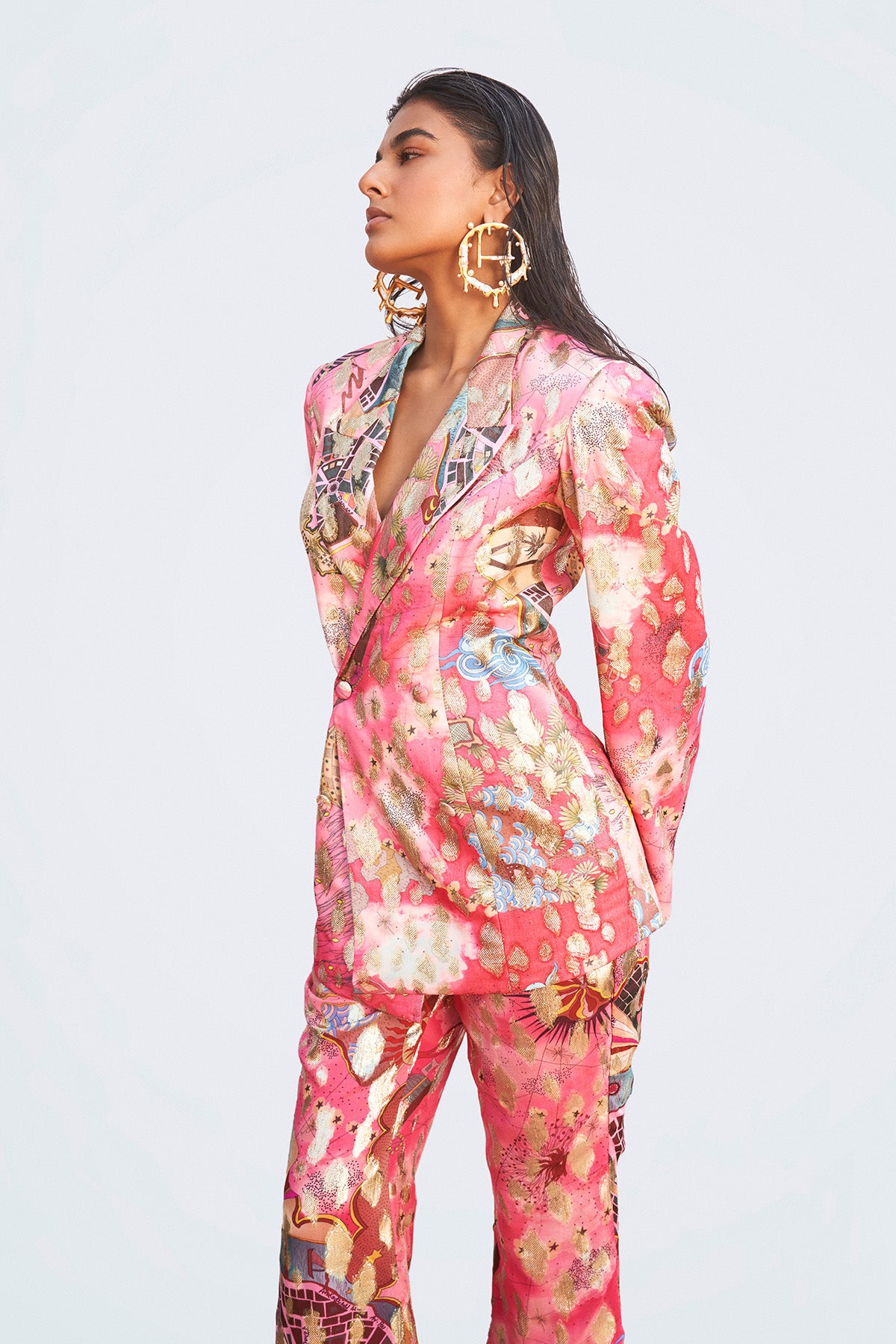 Close-up of fabric print and stitching on left blazer panel.