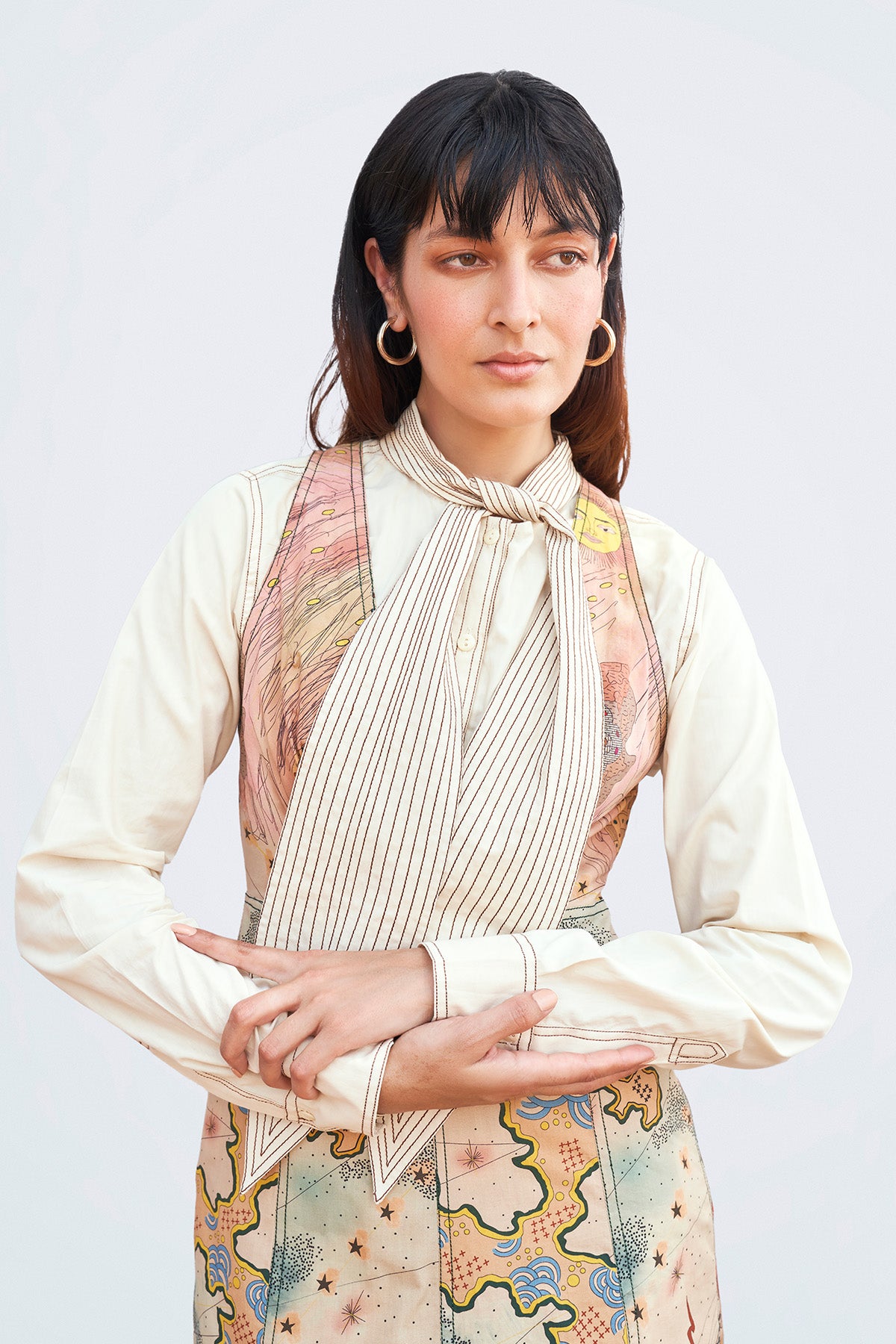 Close-up of sailor collar and tie detail on shirt.

