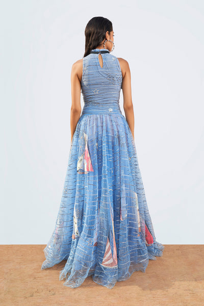 Close-up of embroidery and handwork on left gown panel.