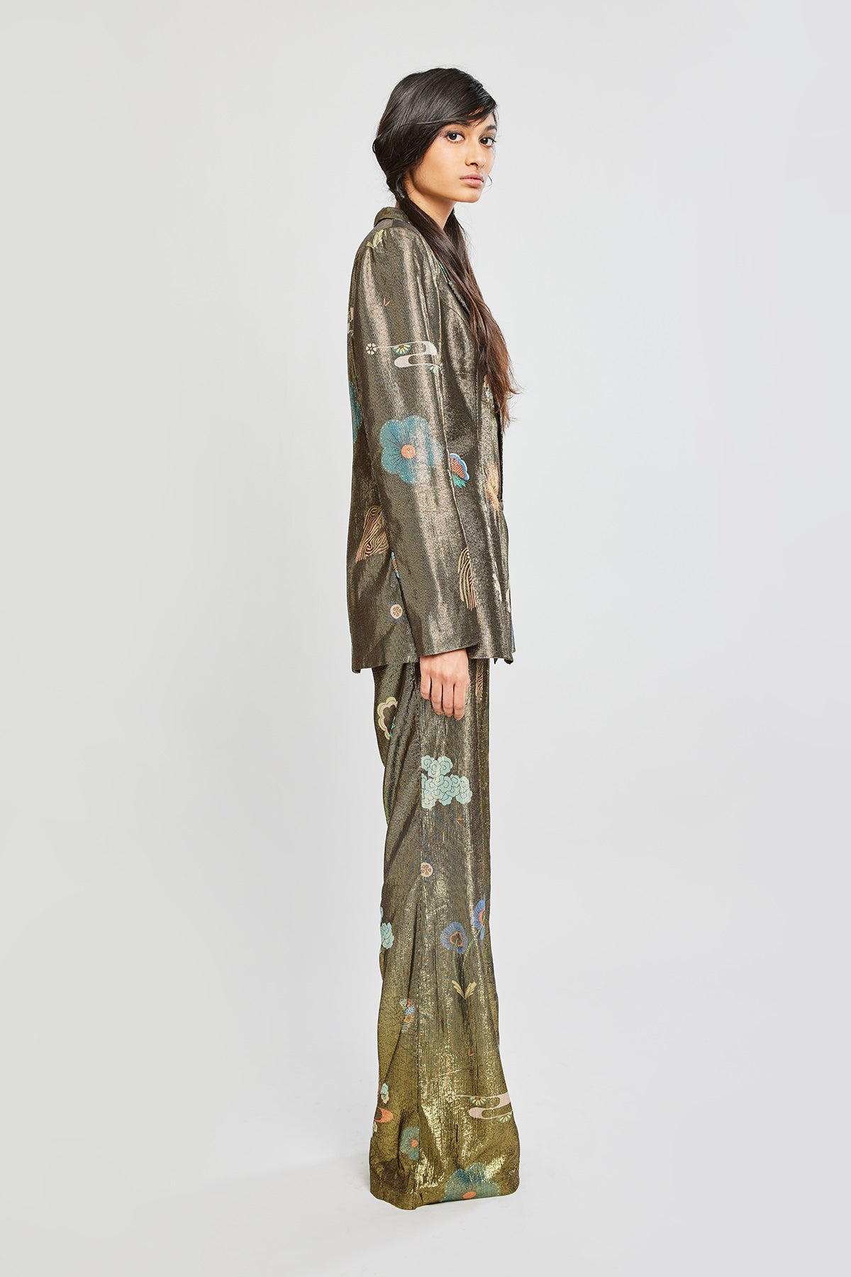 Close-up of left side blazer and pants details