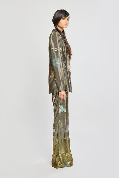 Close-up of left side blazer and pants details