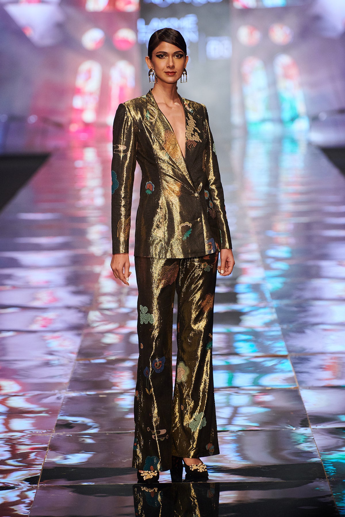 Close-up of right side blazer and pants details