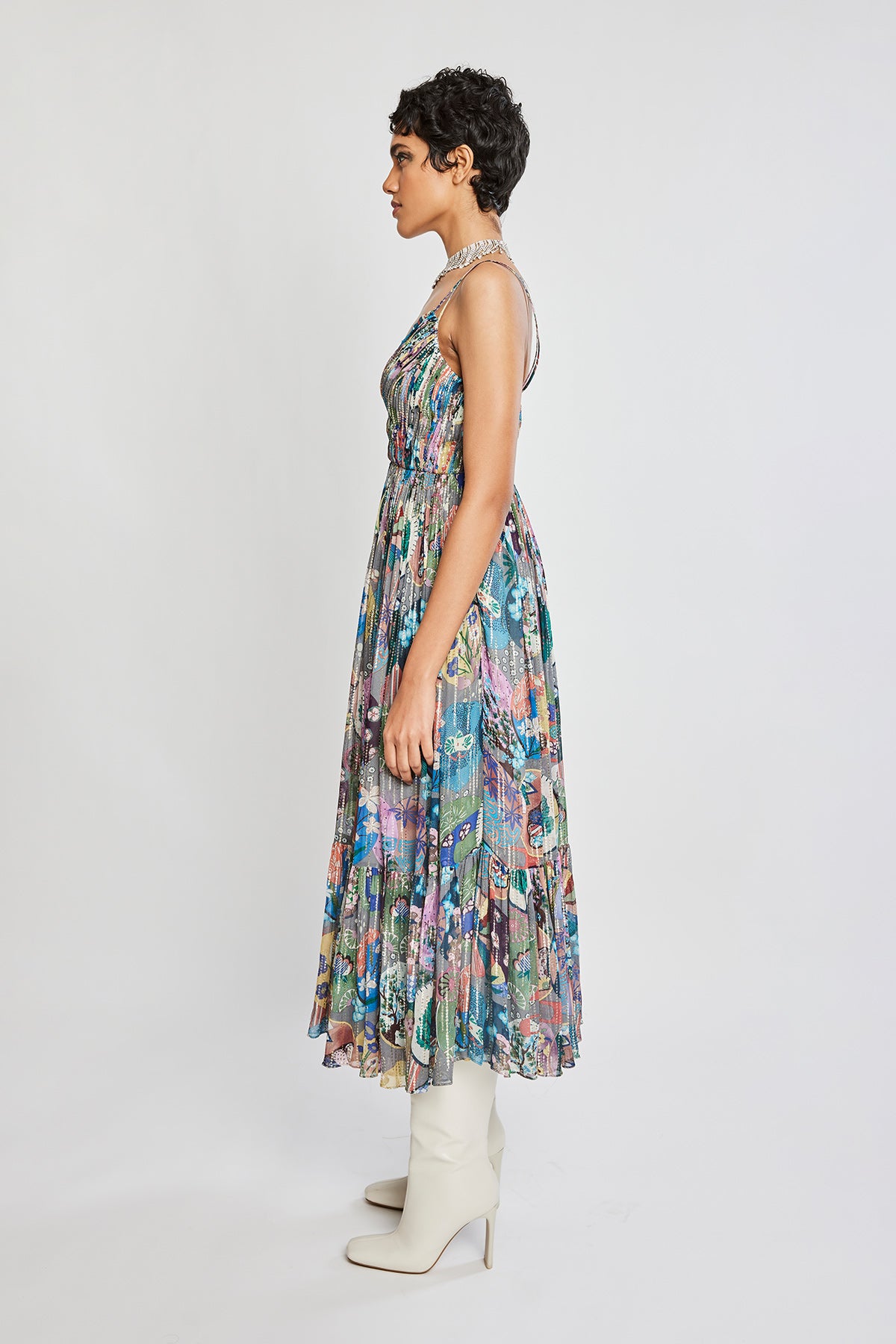 Left side view of Trencadís grey georgette dobby circle gathered midi dress