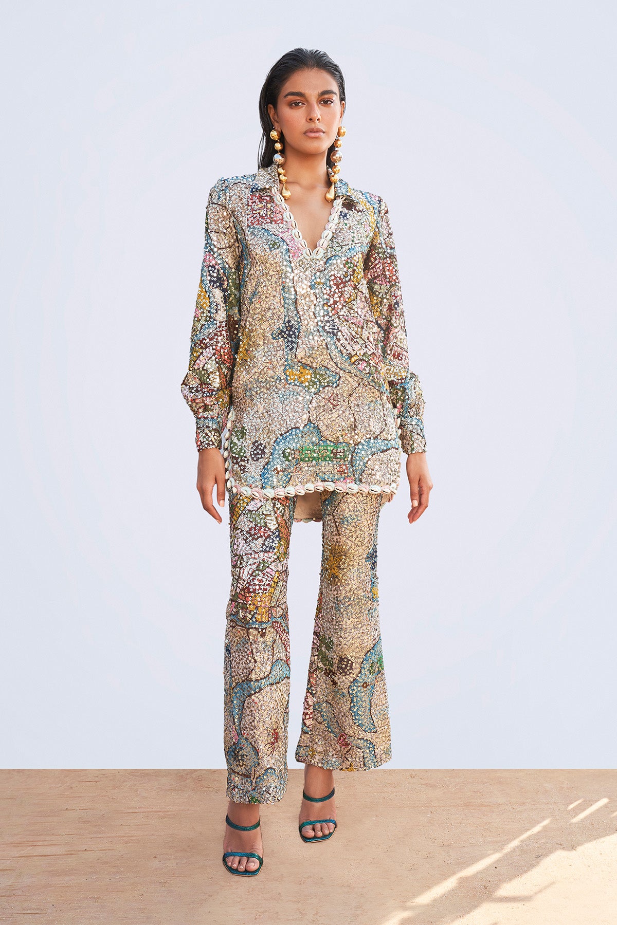 Starboard & Port ivory sequin appliqué short dress tunic with sea shell trimmed V-neckline and high waist trousers shown in a full couture view