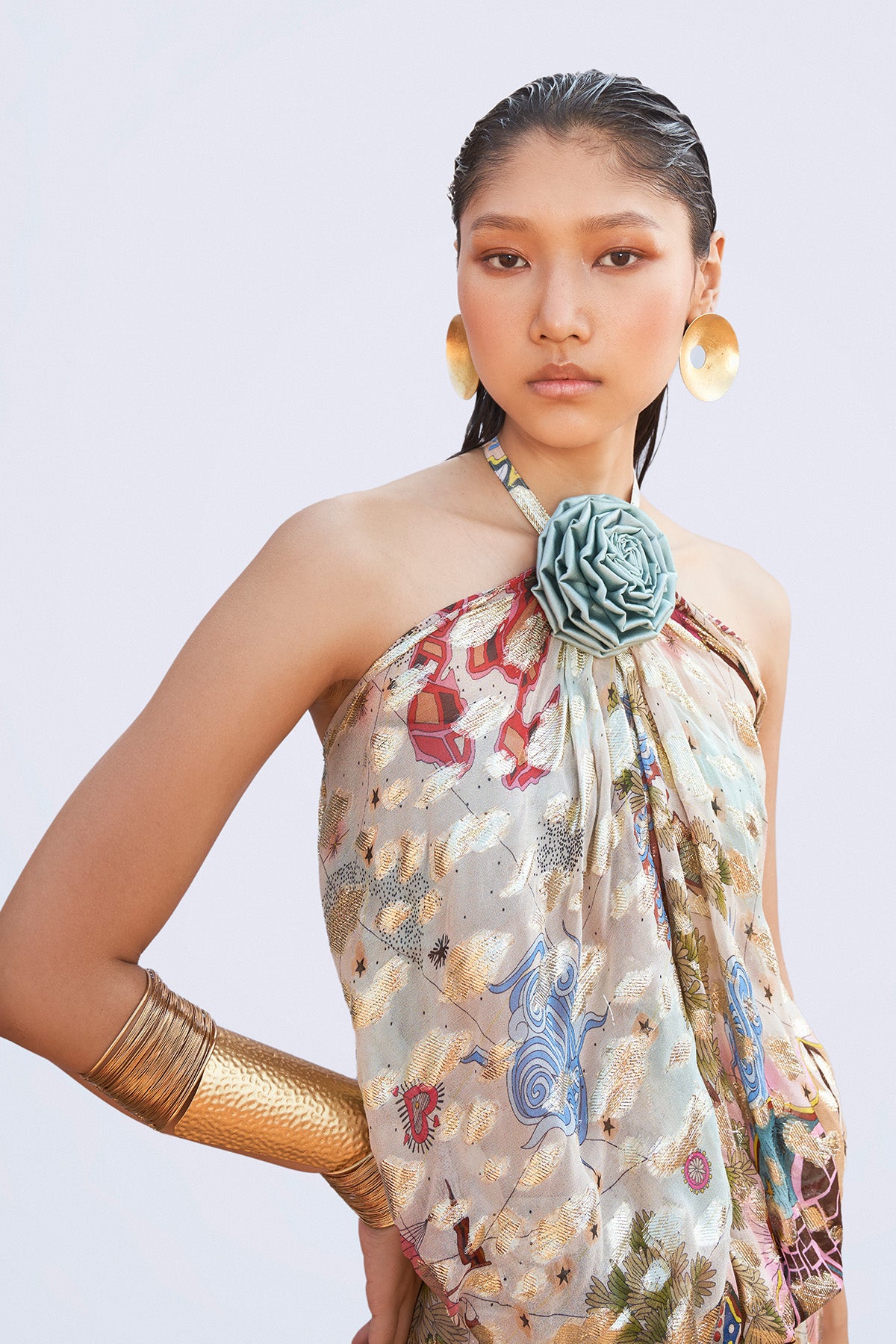 Right view close-up of neck floral detail on dress