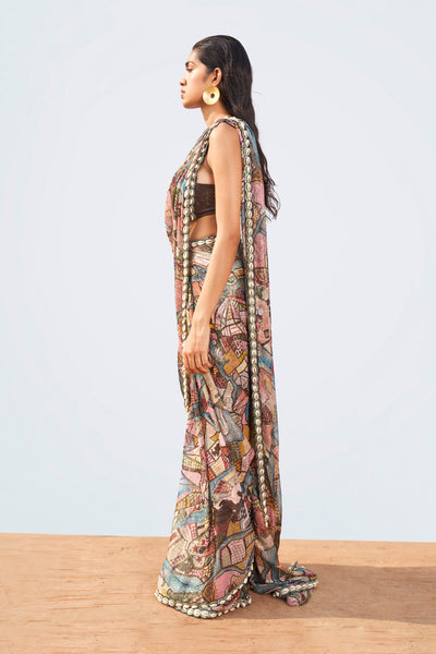 Close-up of saree print and blouse shell trim on left side.