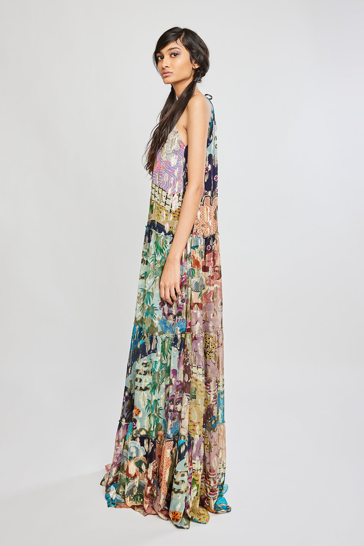 Left side view of Trencadís dobby maze neck maxi dress