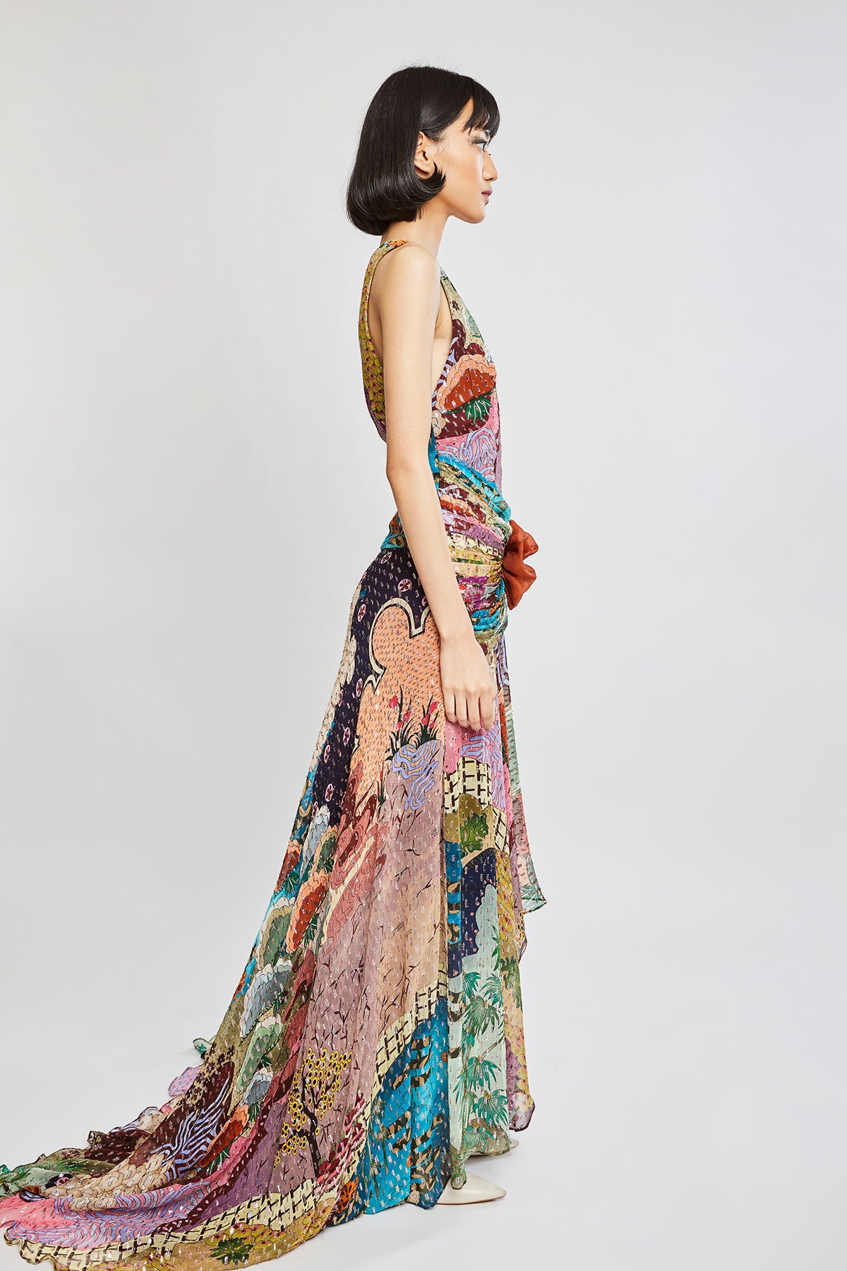 Right side view of Trencadís dobby maze maxi dress with asymmetric hemline