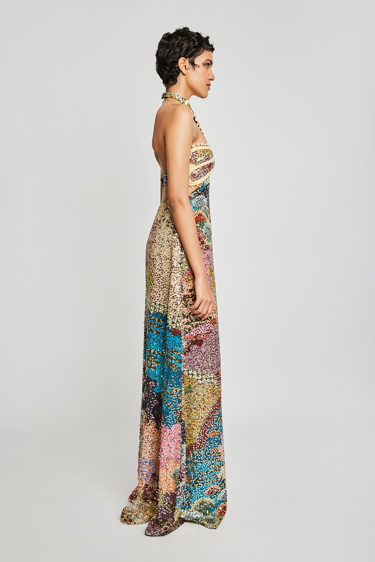 Left side view of the Trencadís maze sequin embellished gown with beaded bodice