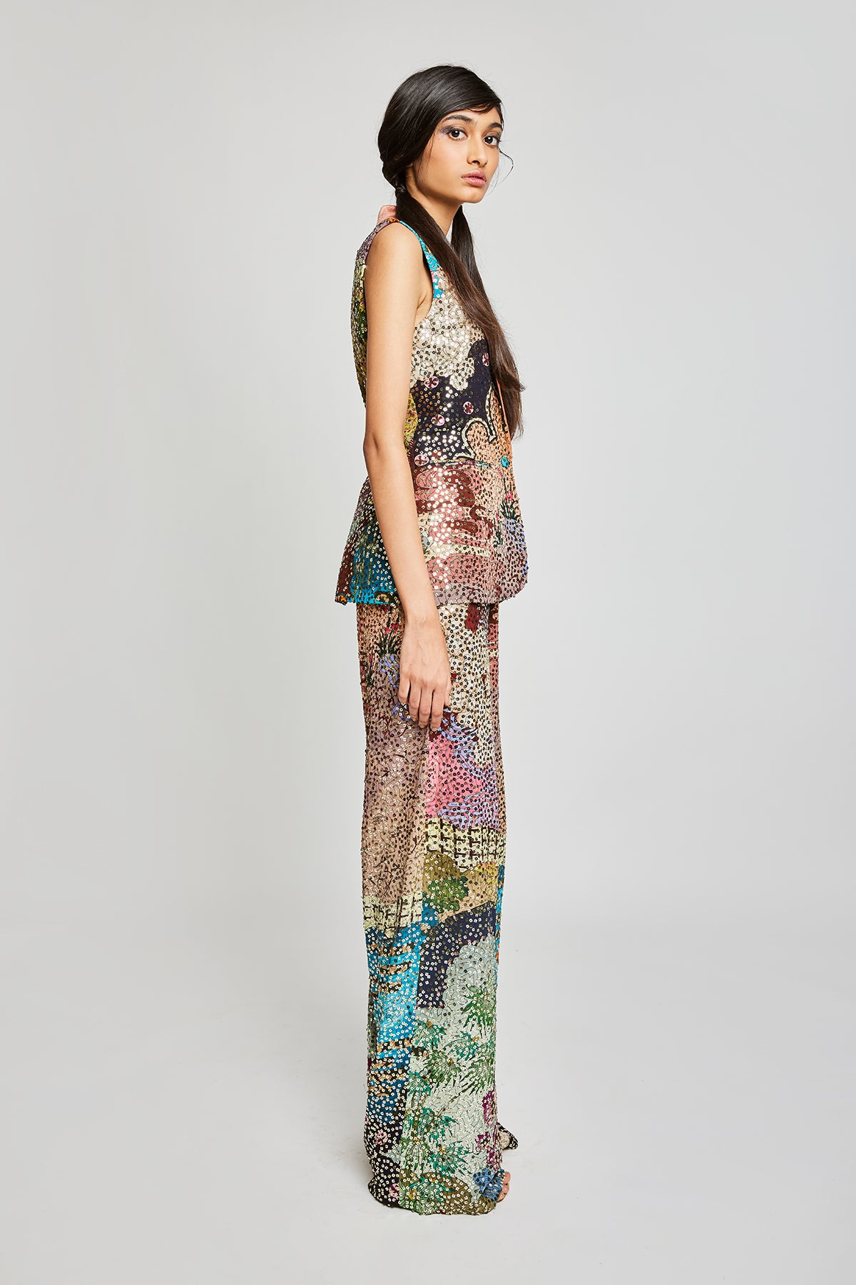 Side angle highlighting the maze embellishment and flowing lines.