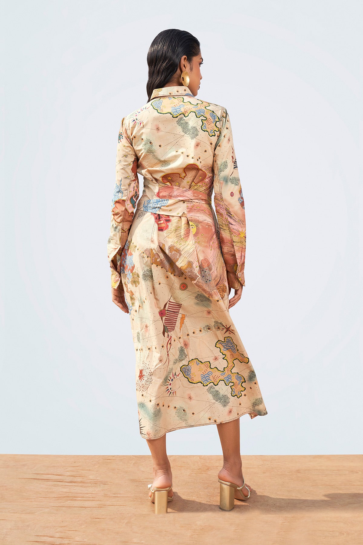 Close-up of applique and mirror work on left lehenga panel.