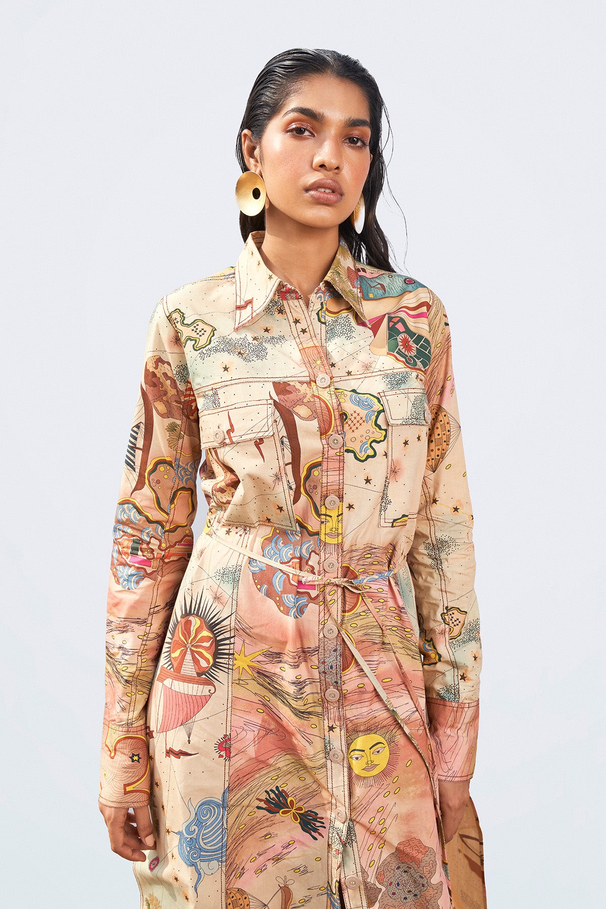 Left profile of Periwinkle embellished lehenga, blouse, and dupatta set.