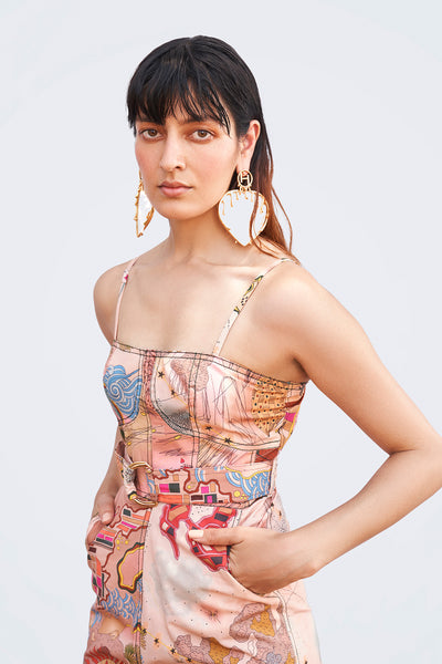 Close-up of print and fabric texture on jumpsuit front.