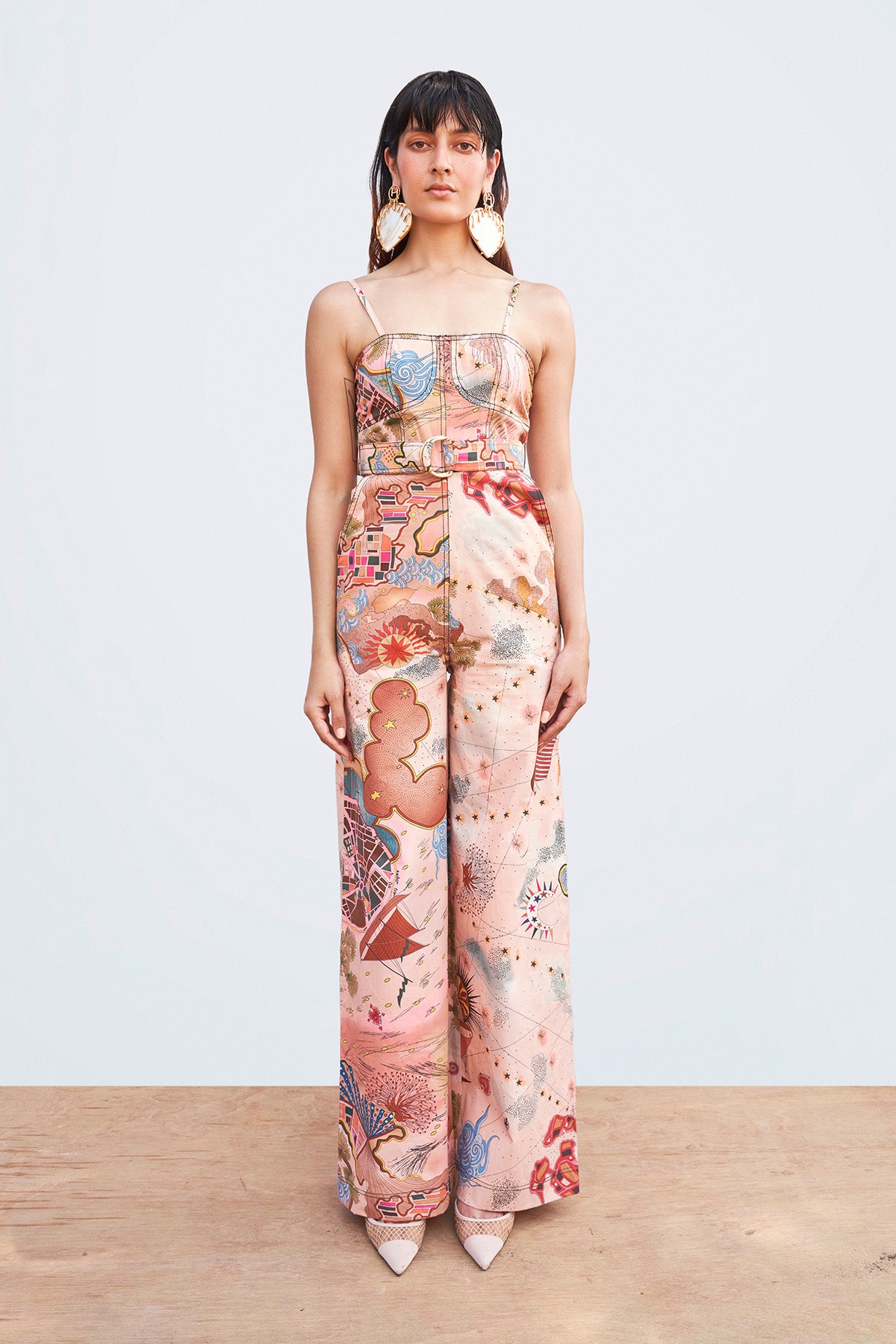 Front view of Starboard & Port peach printed poplin jumpsuit.