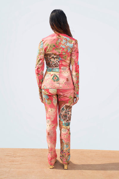 Right side view of printed blazer and pant set.