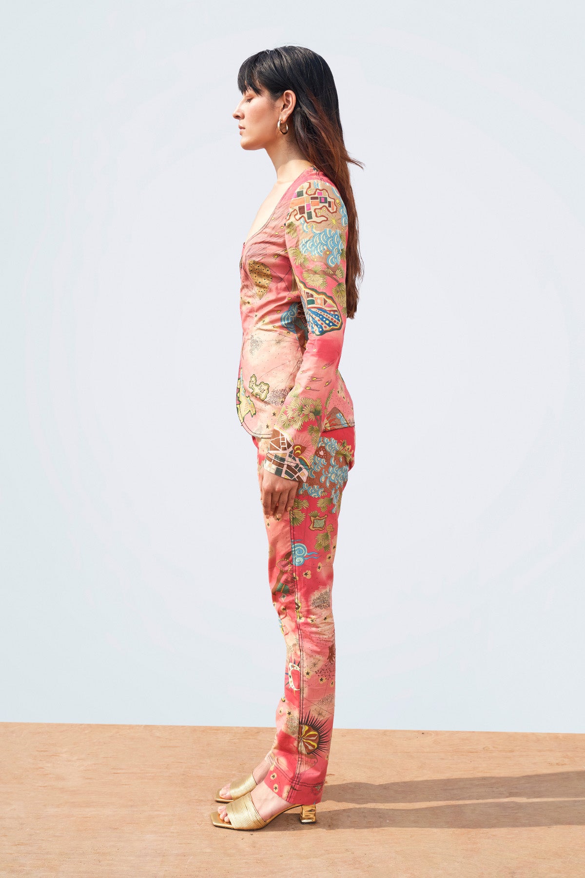 Close-up of print and stitching on left blazer panel.