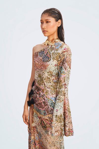 Motion frame showing fluid sequin movement on Roshni Chopra’s bow slit gown