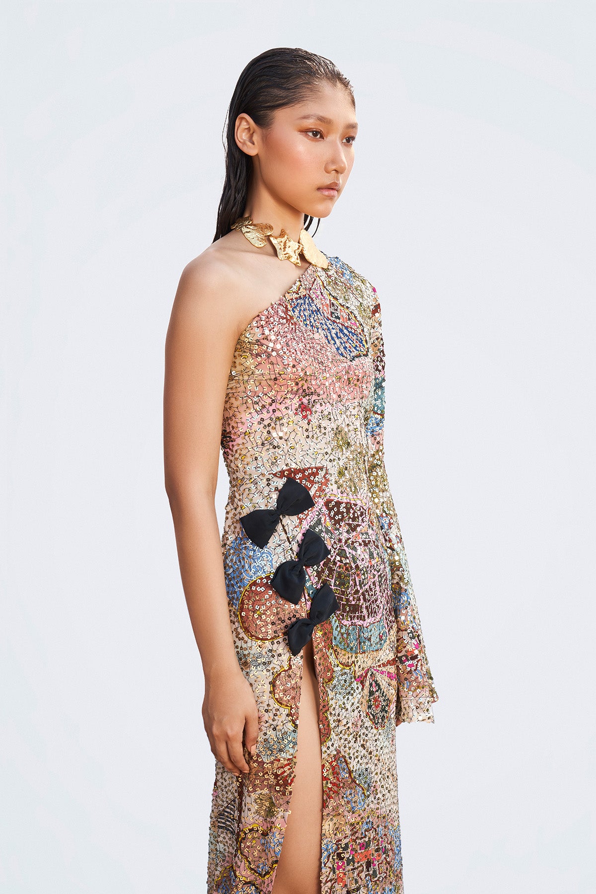 One shoulder neckline detail of the Muse sequined gown styled on Roshni Chopra