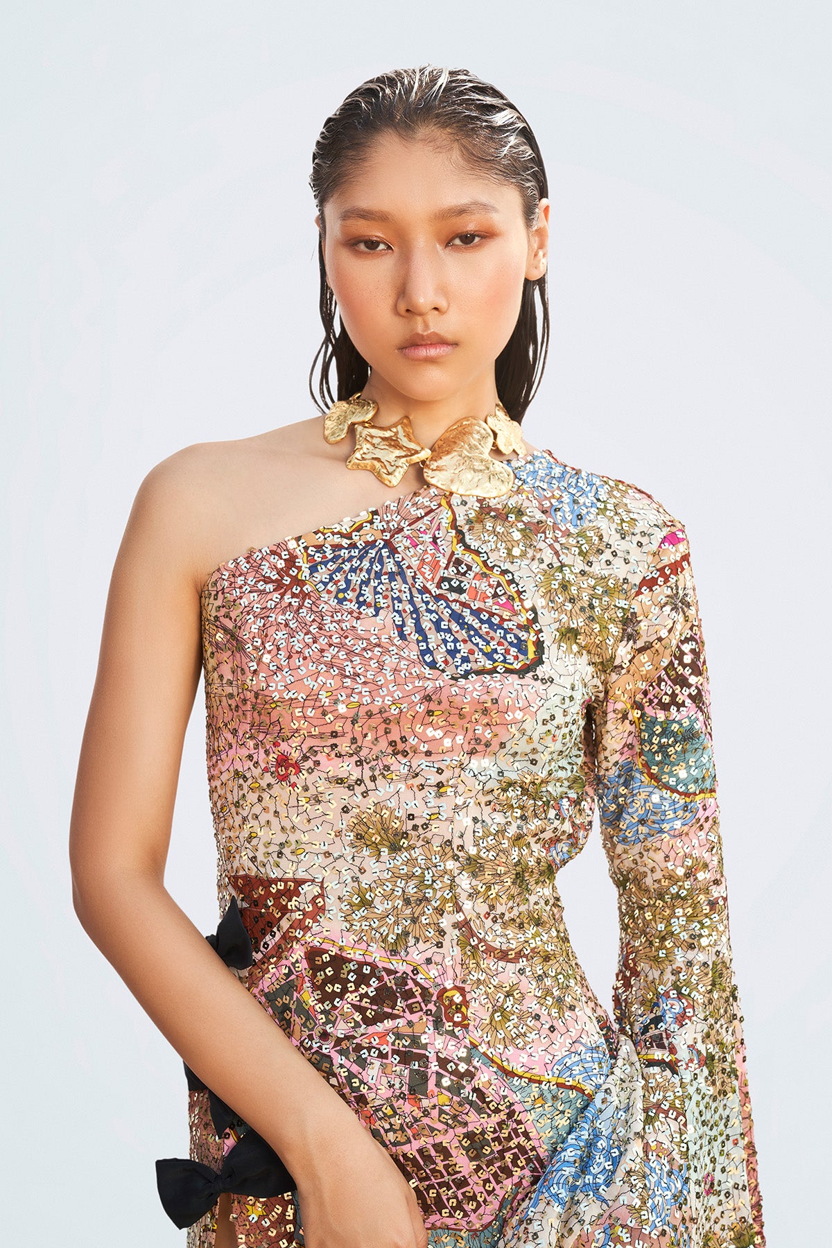 Sequin texture closeup capturing the multicolor shimmer on Roshni Chopra’s Muse gown