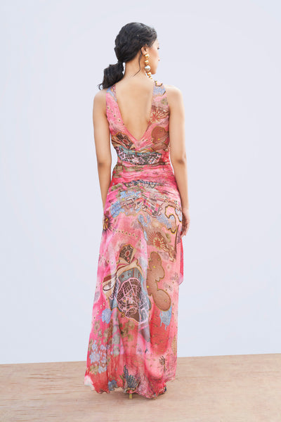 Right side view of printed gathered dress.